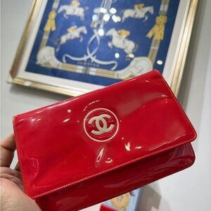 CHANEL Red Patent Leather Clutch with White CC Emblem